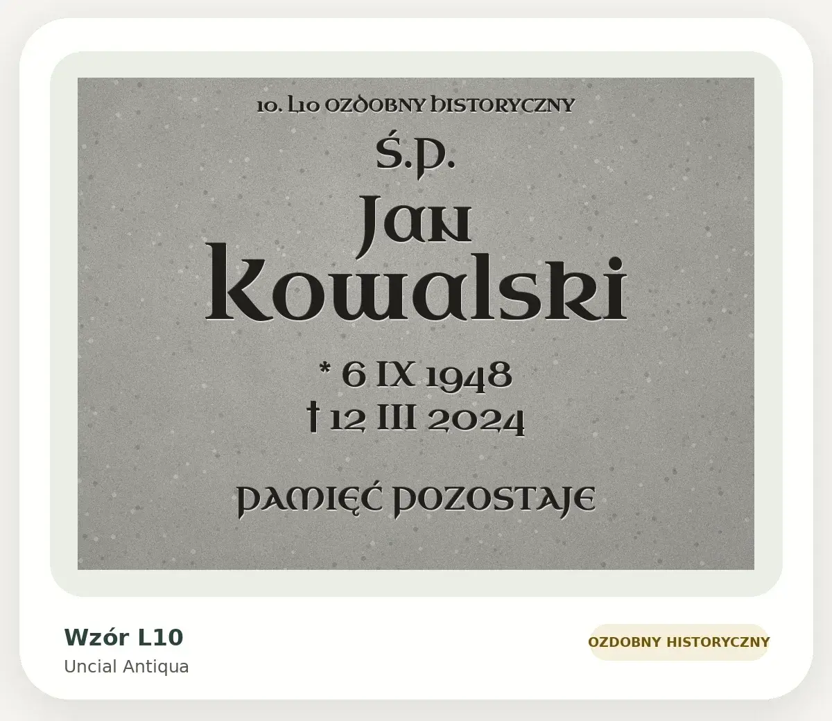 Wzór liternictwa L10 — Uncial Antiqua (ozdobny historyczny): przykładowa inskrypcja na szarej płycie